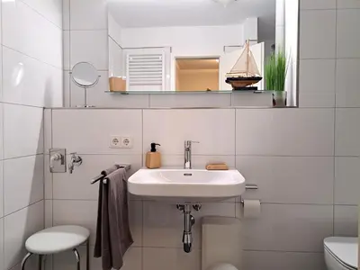 Ein Badezimmer in der Unterkunft Achtern Diek Haus 7 Wohnung 3