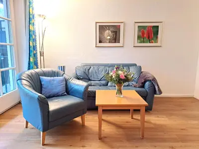 Ein Sitzbereich in der Unterkunft Achtern Diek Haus 7 Wohnung 3