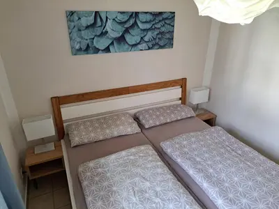 Ein Bett oder Betten in einem Zimmer der Unterkunft Achtern Diek Haus 7 Wohnung 4