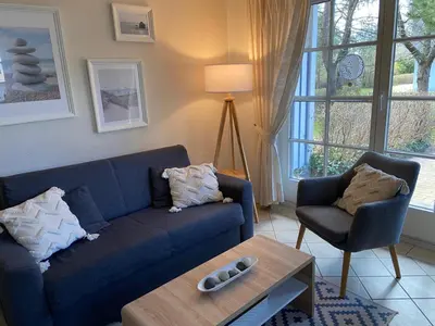 Ein Sitzbereich in der Unterkunft Achtern Diek Haus 7 Wohnung 4