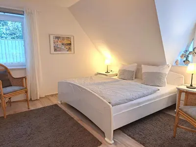 Ein Bett oder Betten in einem Zimmer der Unterkunft Bahnhofstrasse 5 Wohnung Zingst