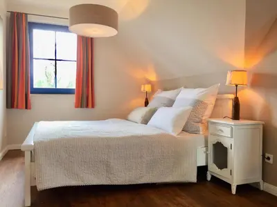 Ein Bett oder Betten in einem Zimmer der Unterkunft Wiesenstraße 65 Haus Wilderei