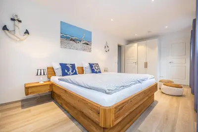 Ein Bett oder Betten in einem Zimmer der Unterkunft Haus Mehlsgang 8