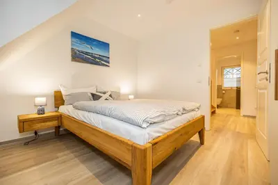 Ein Bett oder Betten in einem Zimmer der Unterkunft Haus Mehlsgang 8