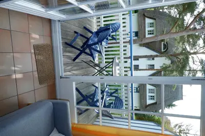 Ein Sitzbereich in der Unterkunft Achtern Diek Haus 8 Wohnung 4