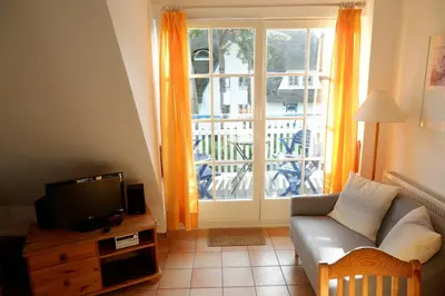Ein Sitzbereich in der Unterkunft Achtern Diek Haus 8 Wohnung 4
