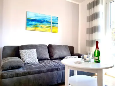 Ein Sitzbereich in der Unterkunft Hägerende 66 Haus Windrose Wohnung Ostwind