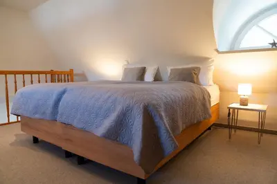 Ein Bett oder Betten in einem Zimmer der Unterkunft Achtern Diek Haus 9 Wohnung 5