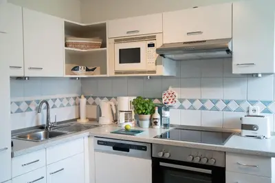 Küche/Küchenzeile in der Unterkunft Achtern Diek Haus 9 Wohnung 5