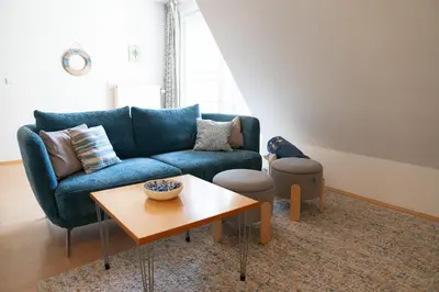 Ein Sitzbereich in der Unterkunft Achtern Diek Haus 9 Wohnung 5