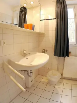 Ein Badezimmer in der Unterkunft Achtern Diek Haus 11 Wohnung 1