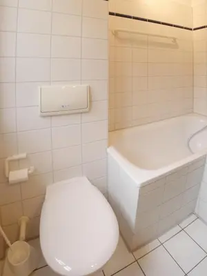 Ein Badezimmer in der Unterkunft Achtern Diek Haus 11 Wohnung 1