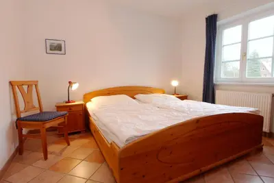 Ein Bett oder Betten in einem Zimmer der Unterkunft Störtebekerstrasse 9 Wohnung 9