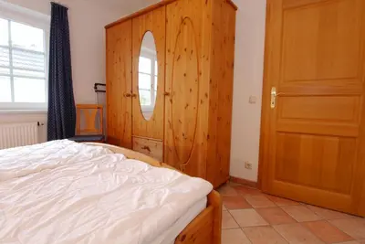 Ein Bett oder Betten in einem Zimmer der Unterkunft Störtebekerstrasse 9 Wohnung 9