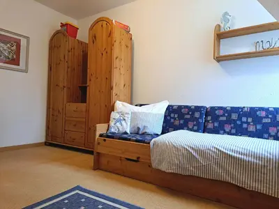 Ein Bett oder Betten in einem Zimmer der Unterkunft Achtern Diek Haus 12d Wohnung 6