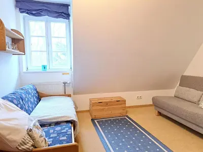 Ein Sitzbereich in der Unterkunft Achtern Diek Haus 12d Wohnung 6