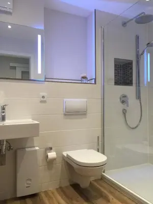 Ein Badezimmer in der Unterkunft Achtern Diek Haus 13b Wohnung 3