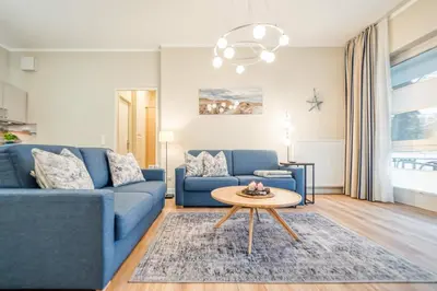 Ein Sitzbereich in der Unterkunft Seestraße 54 Wohnung 1 Seegras
