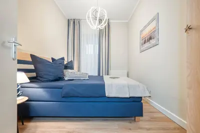 Ein Bett oder Betten in einem Zimmer der Unterkunft Seestraße 54 Wohnung 1 Seegras