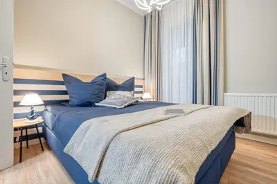 Ein Bett oder Betten in einem Zimmer der Unterkunft Seestraße 54 Wohnung 1 Seegras