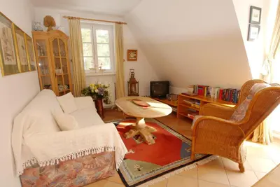 Ein Sitzbereich in der Unterkunft Achtern Diek Haus 13d Wohnung 6