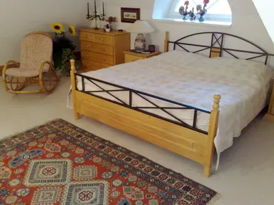 Ein Bett oder Betten in einem Zimmer der Unterkunft Achtern Diek Haus 13d Wohnung 6