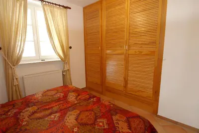 Ein Bett oder Betten in einem Zimmer der Unterkunft Achtern Diek Haus 13d Wohnung 6