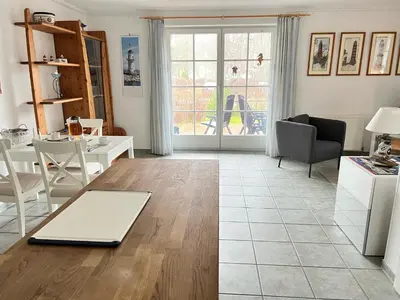 Ein Sitzbereich in der Unterkunft Achtern Diek Haus 15d Wohnung 3
