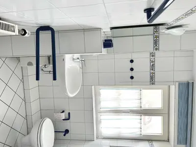 Ein Badezimmer in der Unterkunft Achtern Diek Haus 15d Wohnung 3