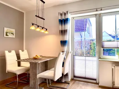 Ein Sitzbereich in der Unterkunft Hägerende 66 Haus Windrose Wohnung Westwind