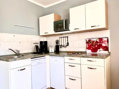 Küche/Küchenzeile in der Unterkunft Hägerende 66 Haus Windrose Wohnung Westwind