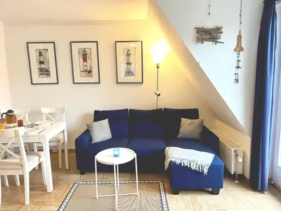 Ein Sitzbereich in der Unterkunft Achtern Diek Haus 15d Wohnung 6