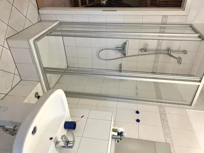 Ein Badezimmer in der Unterkunft Achtern Diek Haus 15d Wohnung 6