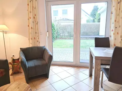 Ein Sitzbereich in der Unterkunft Zur Wellenwiese 22 Wohnung Sanderling