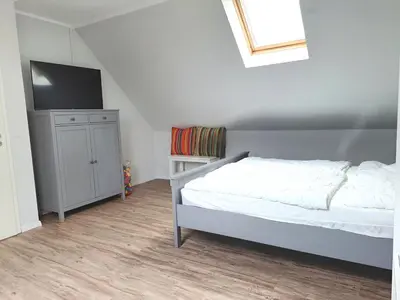 Ein Bett oder Betten in einem Zimmer der Unterkunft Zur Wellenwiese 22 Wohnung Kiebitz