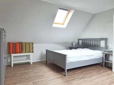 Ein Bett oder Betten in einem Zimmer der Unterkunft Zur Wellenwiese 22 Wohnung Kiebitz