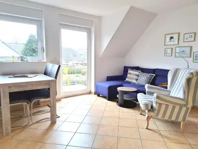 Ein Sitzbereich in der Unterkunft Zur Wellenwiese 22 Wohnung Kiebitz