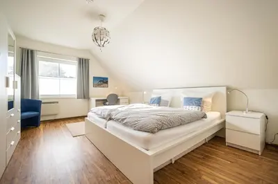 Ein Bett oder Betten in einem Zimmer der Unterkunft Rosenberg Haus 16a