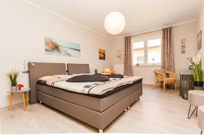 Ein Bett oder Betten in einem Zimmer der Unterkunft Lindenstraße 43 Wohnung 2