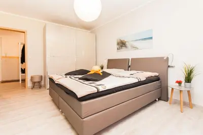 Ein Bett oder Betten in einem Zimmer der Unterkunft Lindenstraße 43 Wohnung 2