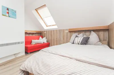 Ein Bett oder Betten in einem Zimmer der Unterkunft Am Bahndamm 81a Haus Schwalbe
