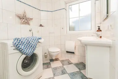 Ein Badezimmer in der Unterkunft Am Bahndamm 81a Haus Schwalbe