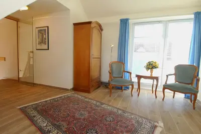 Ein Sitzbereich in der Unterkunft Boddenblick Wohnung 30