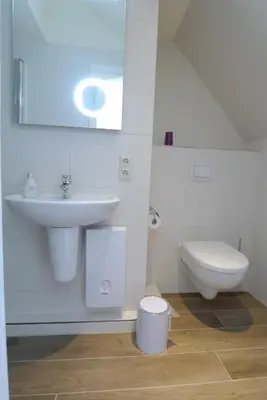 Ein Badezimmer in der Unterkunft Boddenblick Wohnung 30