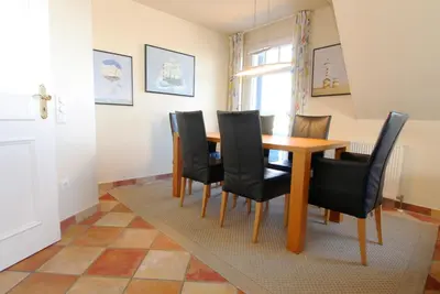 Ein Sitzbereich in der Unterkunft Boddenblick Wohnung 30