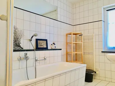 Ein Badezimmer in der Unterkunft Kavelweg 12 Wohnung Arkona