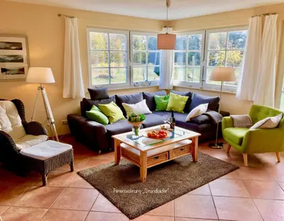 Ein Sitzbereich in der Unterkunft Straminke 4b Wohnung Strandläufer