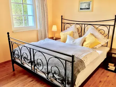 Ein Bett oder Betten in einem Zimmer der Unterkunft Straminke 4b Wohnung Strandläufer