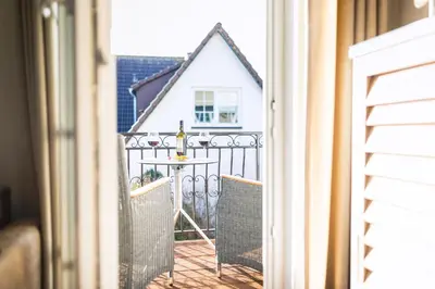 Ein Balkon oder eine Terrasse in der Unterkunft Grüne Siedlung 3 Wohnung Strandliebe