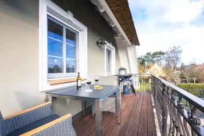 Ein Balkon oder eine Terrasse in der Unterkunft Grüne Siedlung 3 Wohnung Strandliebe